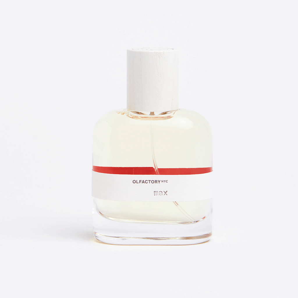 max fragrance bottle with orange stripe on label 