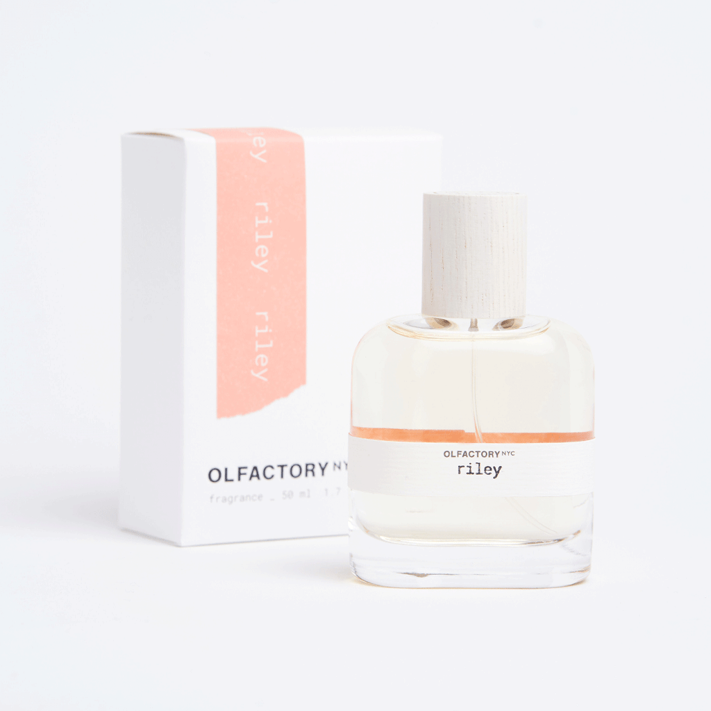 riley fragrance bottle and box with peach details